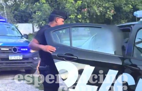 policia detenido tierra